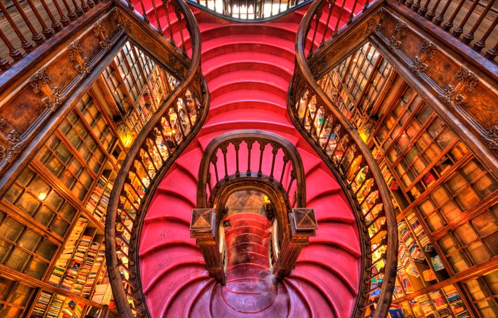 Looking down at the stairwell of the Lello Bookstore